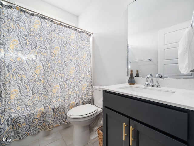 full bathroom with tile patterned flooring, curtained shower, toilet, and vanity