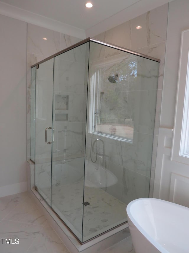 bathroom with recessed lighting, marble finish floor, a shower stall, and baseboards