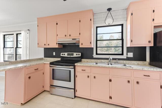 kitchen with electric stove, under cabinet range hood, a sink, a peninsula, and light countertops