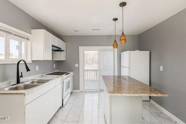 kitchen with white appliances, a kitchen island, a sink, under cabinet range hood, and marble finish floor