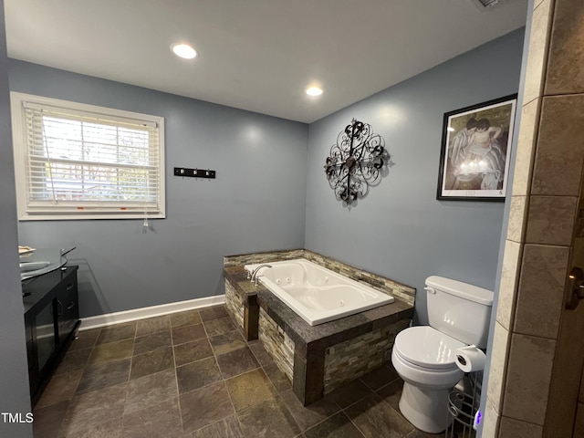 full bathroom with baseboards, toilet, a garden tub, recessed lighting, and vanity