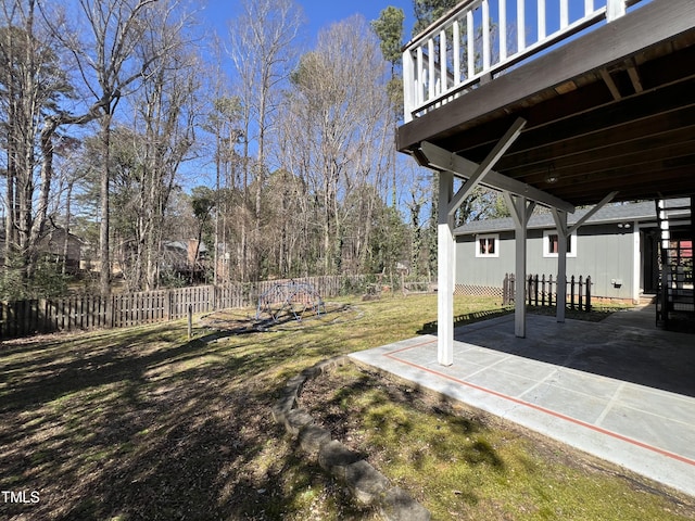 view of yard with a patio and fence