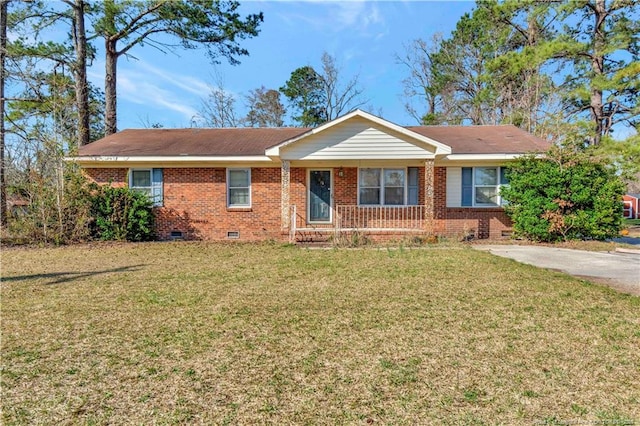 ranch-style house with crawl space, brick siding, and a front yard