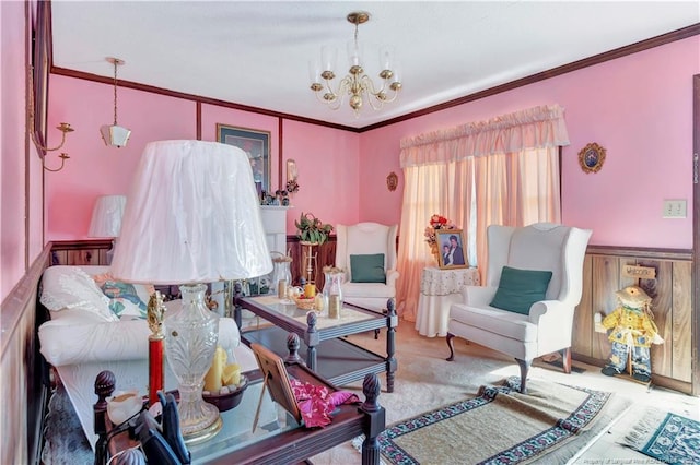 living room with a notable chandelier and ornamental molding