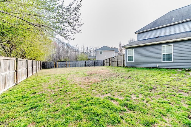 view of yard featuring a fenced backyard