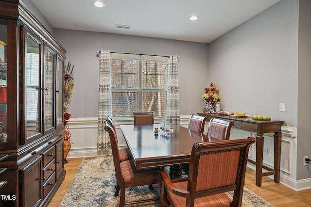 dining room featuring recessed lighting, a healthy amount of sunlight, and light wood finished floors