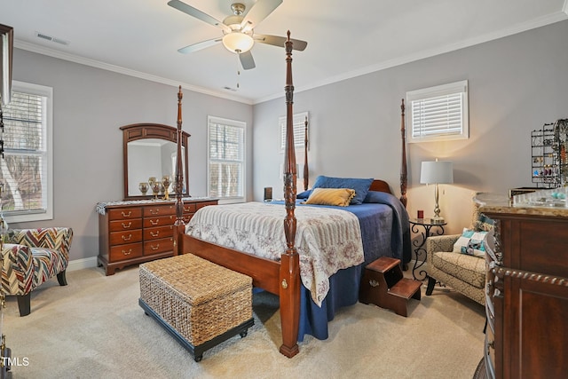 bedroom featuring light carpet, visible vents, crown molding, and baseboards