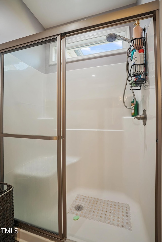 bathroom with a stall shower