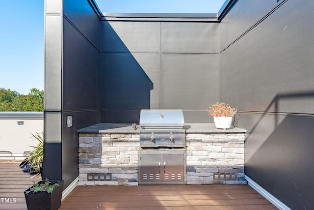 view of patio featuring a deck and area for grilling