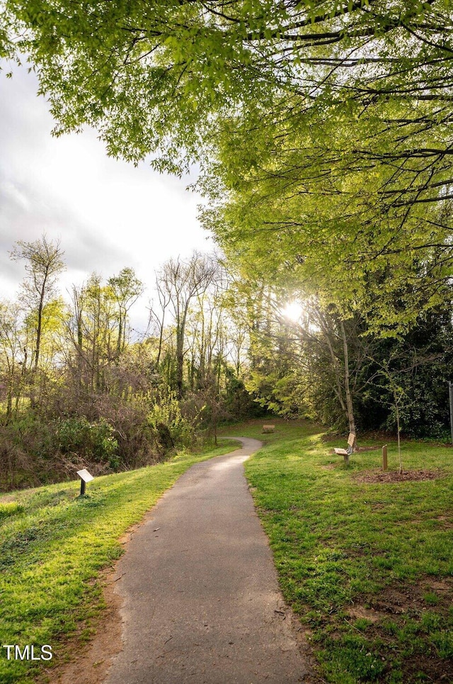 surrounding community with a lawn