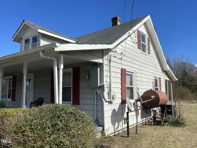990 County Home Rd, Blanch, NC 27212 - view of property exterior featuring a chimney