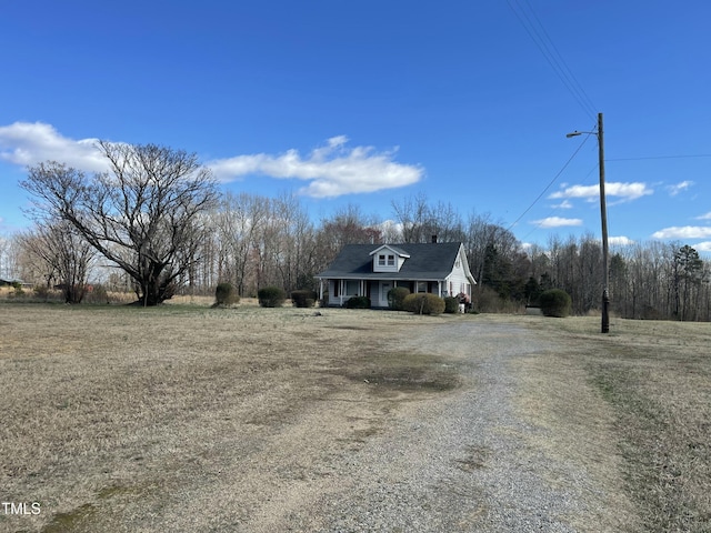 990 County Home Rd, Blanch, NC 27212 - view of front of home with a porch and driveway