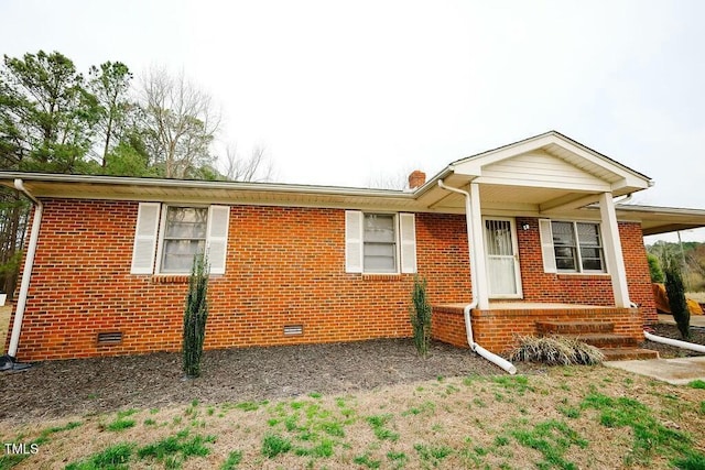 ranch-style house with brick siding