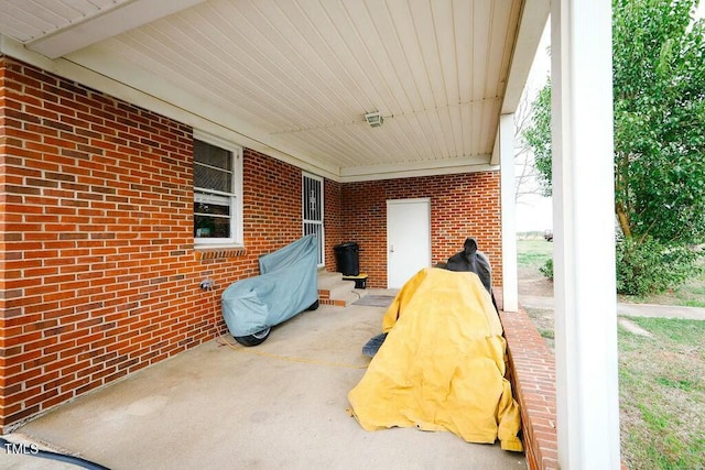 view of patio / terrace with a carport