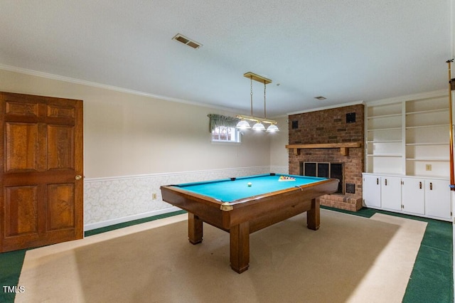 recreation room featuring visible vents, a wainscoted wall, billiards, carpet flooring, and a brick fireplace