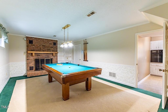 rec room featuring visible vents, carpet, and a wainscoted wall