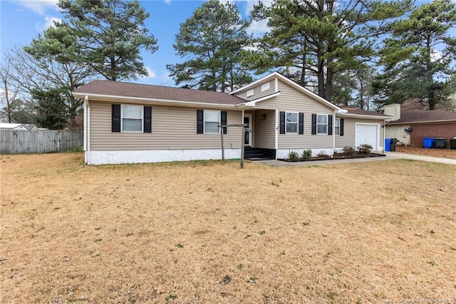 single story home featuring a front lawn, fence, a garage, and driveway