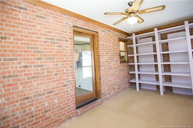 storage room with a ceiling fan