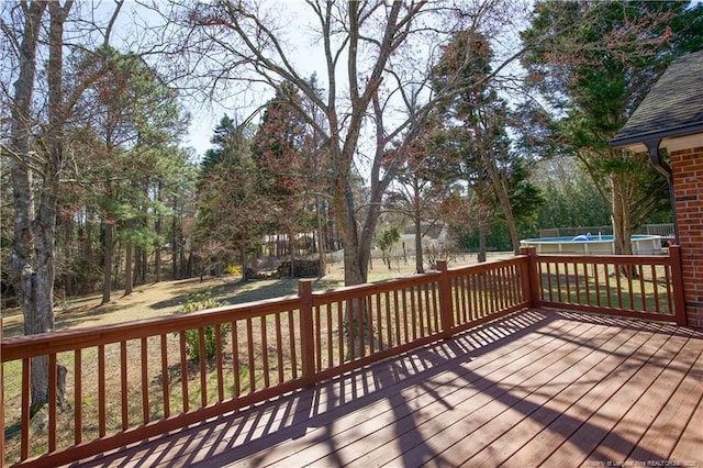 deck with an outdoor pool