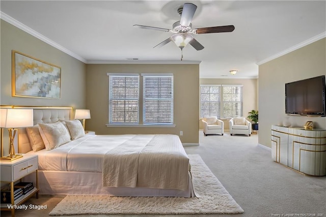 bedroom with visible vents, crown molding, baseboards, and carpet floors