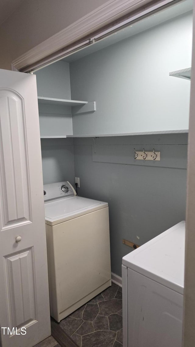 laundry room featuring laundry area and washer and dryer