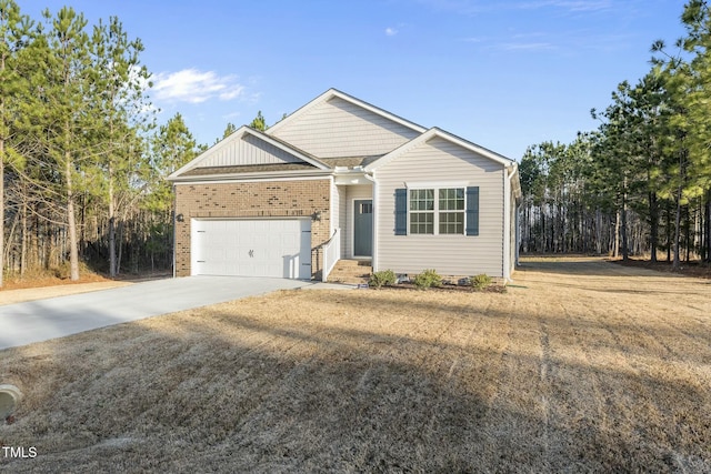 view of front of house with concrete driveway and an attached garage