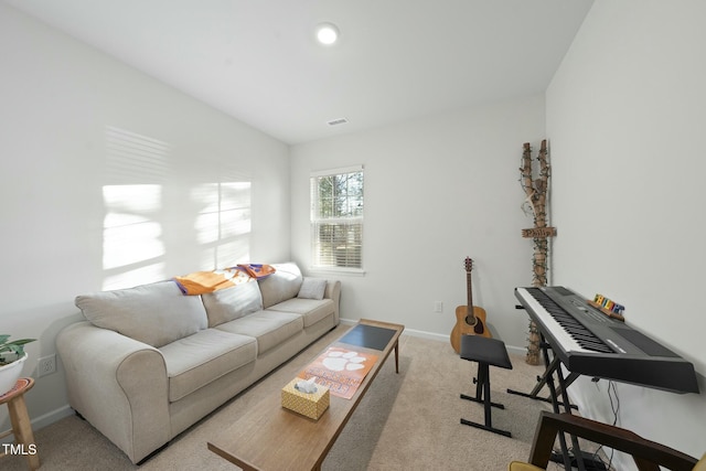 carpeted living room with visible vents, baseboards, and lofted ceiling