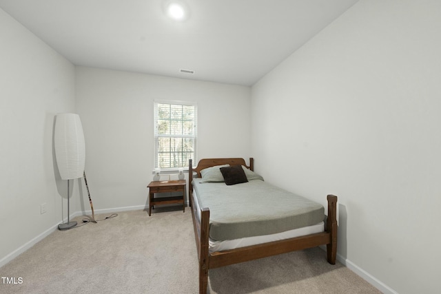 bedroom featuring carpet flooring, baseboards, and visible vents