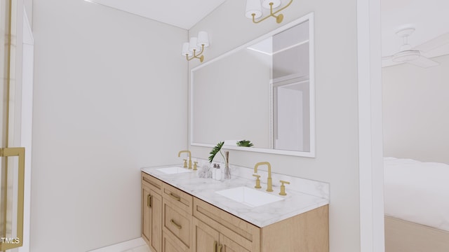 bathroom featuring double vanity and a sink