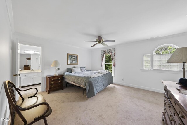 2705 Vestry Way, Raleigh, NC 27613 - bedroom with light carpet, crown molding, baseboards, ensuite bathroom, and ceiling fan