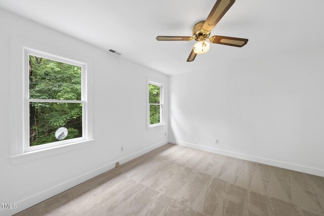 2705 Vestry Way, Raleigh, NC 27613 - empty room with light colored carpet, baseboards, and a ceiling fan