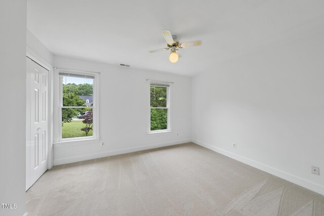 2705 Vestry Way, Raleigh, NC 27613 - spare room with baseboards, carpet floors, and a ceiling fan