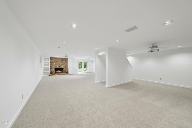 2705 Vestry Way, Raleigh, NC 27613 - unfurnished living room with light carpet, recessed lighting, baseboards, a ceiling fan, and a fireplace