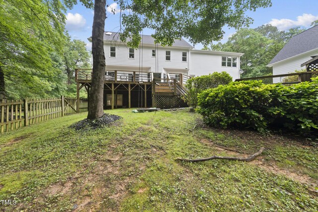 2705 Vestry Way, Raleigh, NC 27613 - rear view of house with a deck, fence, and stairs