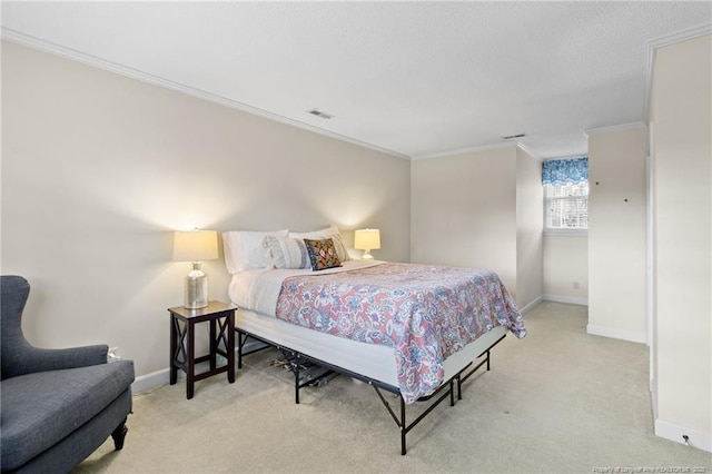 bedroom featuring light carpet, visible vents, baseboards, and ornamental molding