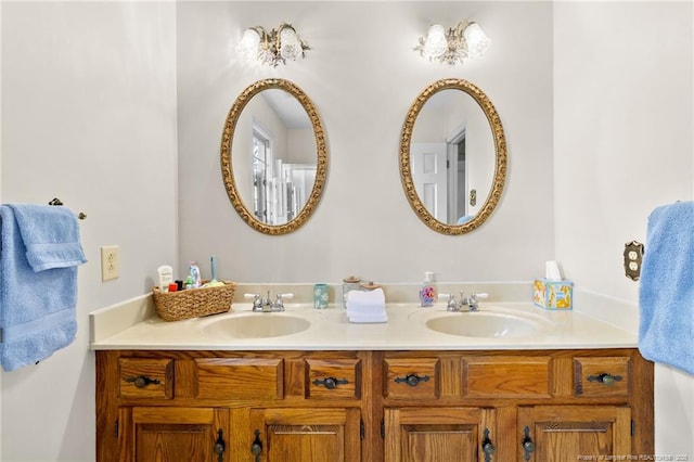 bathroom featuring double vanity and a sink