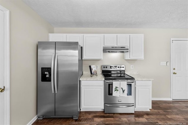 kitchen with white cabinetry, dark wood finished floors, under cabinet range hood, and stainless steel appliances