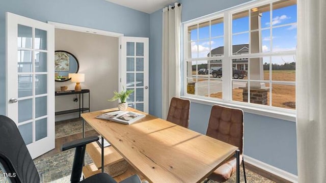 office featuring wood finished floors and baseboards