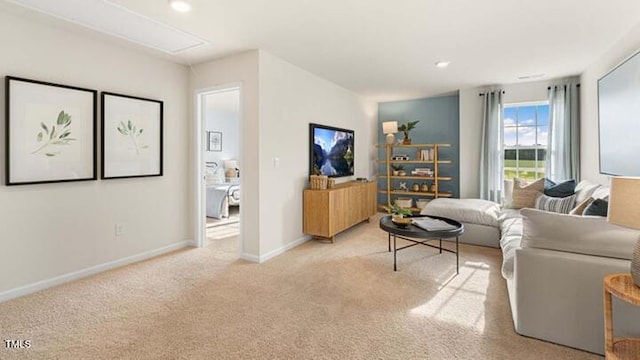 living area with recessed lighting, baseboards, carpet, and attic access