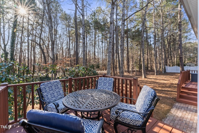 deck featuring outdoor dining area