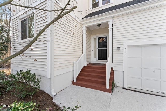 entrance to property with a garage