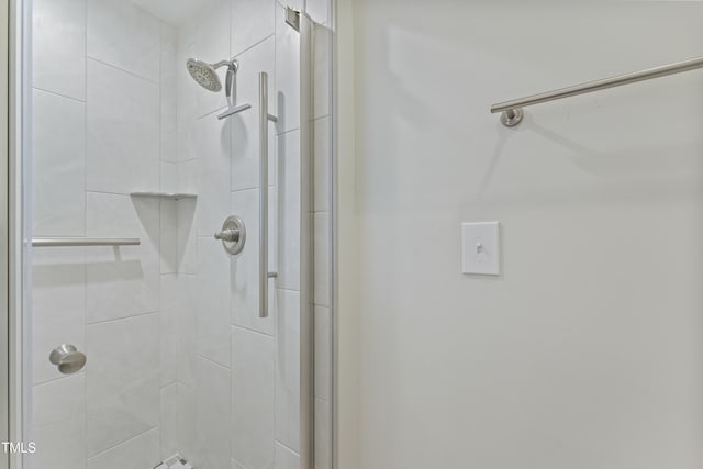 bathroom with a stall shower