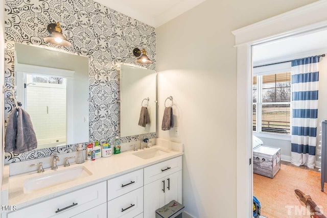 bathroom featuring double vanity and a sink