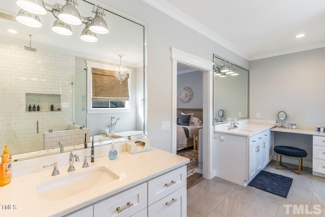 full bathroom with a shower stall, a notable chandelier, crown molding, and a sink