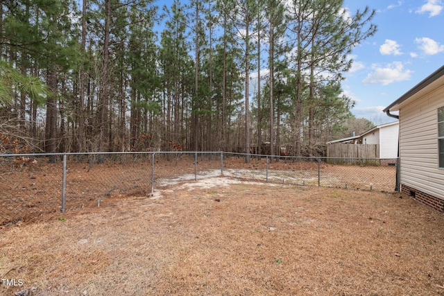 view of yard with fence