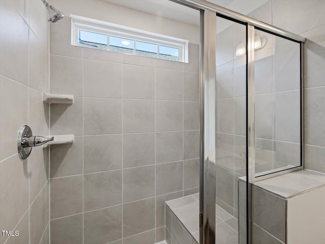 full bathroom featuring a healthy amount of sunlight and a stall shower