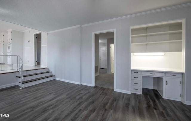 unfurnished living room featuring visible vents, baseboards, dark wood finished floors, ornamental molding, and built in desk