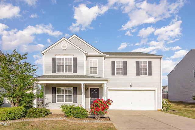 1009 Limeberry Ct, Clayton, NC 27520 - traditional home featuring a porch, driveway, and a garage