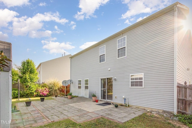 1009 Limeberry Ct, Clayton, NC 27520 - rear view of house with fence and a patio area