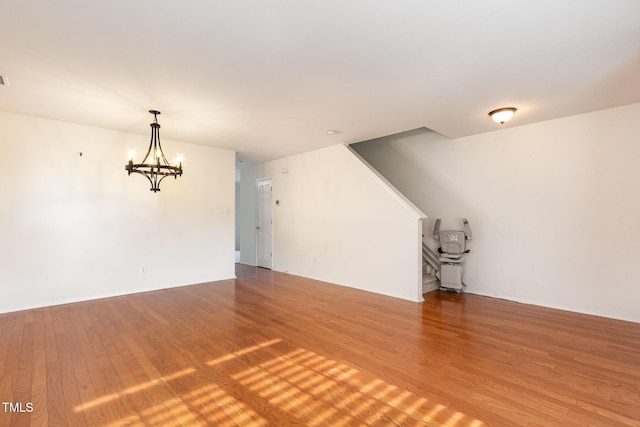 1009 Limeberry Ct, Clayton, NC 27520 - interior space with a notable chandelier and light wood-style floors